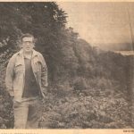 Man standing in front of landscape