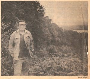 Man standing in front of landscape